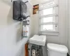 Bathroom featuring sink and toilet