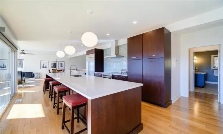 Kitchen featuring quartz countertops.