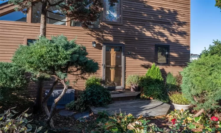 Doorway to property featuring a deck