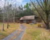 View of front of home featuring a front lawn