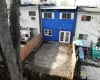 Back of property with french doors and a patio