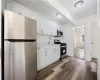 Kitchen w/ crispy white cabinets, stainless steel appliances, 2nd Floor unit