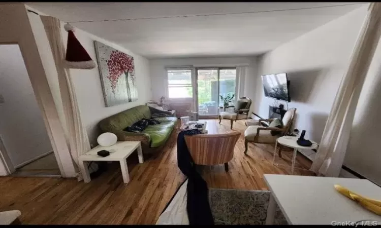 Sitting room featuring hardwood / wood-style floors