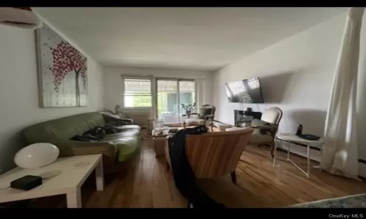 Living room featuring hardwood / wood-style flooring