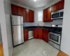 Kitchen featuring sink and stainless steel appliances