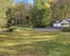 View of yard featuring a garage