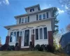 View of front of house featuring a front lawn