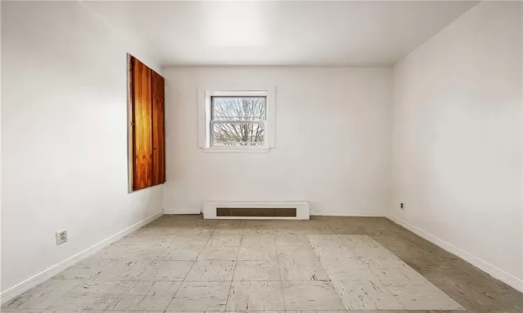 View of tiled spare room