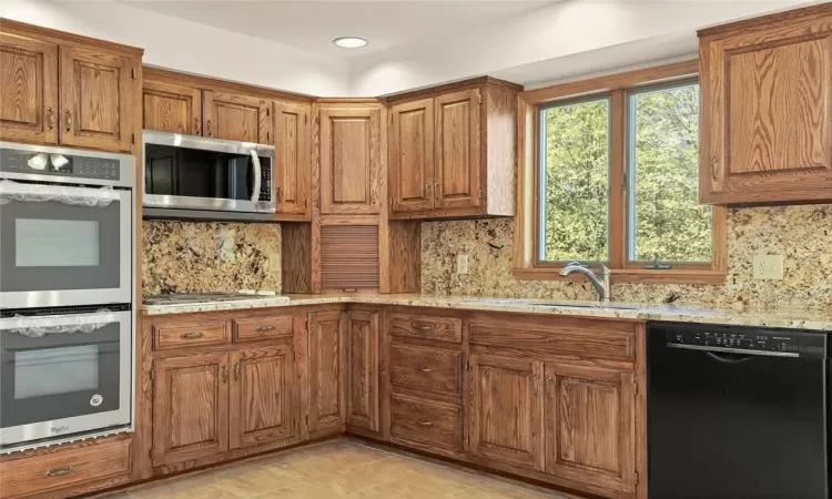 No need to get frantic in this Kitchen, with new double oven, new dishwasher, new microwave and refrigerator  with ice/water dispenser. ! And let's not forget the beautiful 4 burner gas cooktop.