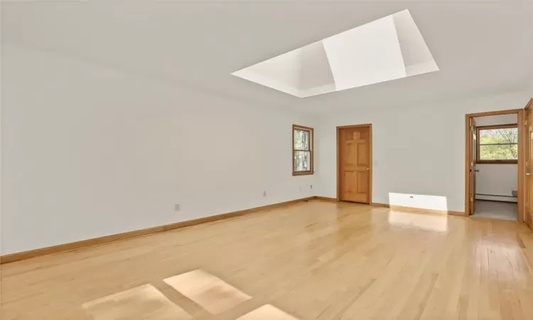 Spacious Primary Bedroom with an oversized walk in closet and Bathroom.