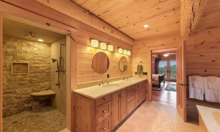 Bathroom featuring independent shower and bath, wooden walls, and wood ceiling