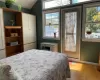 Master bedroom w/door leading to private deck.