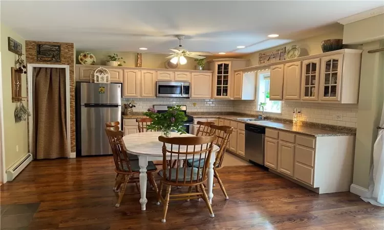 Spacious kitchen with pantry and lots of cabinets & counter space.