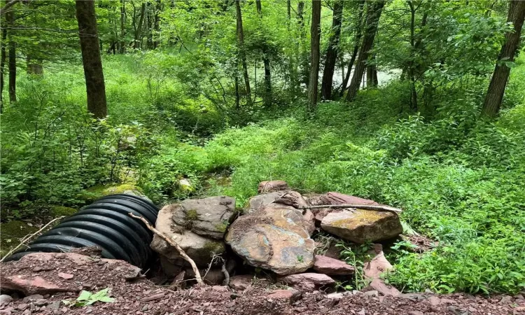 Culvert outlet, which feeds the pond- this new culvert allows for construction vehicles to access multiple build sites.