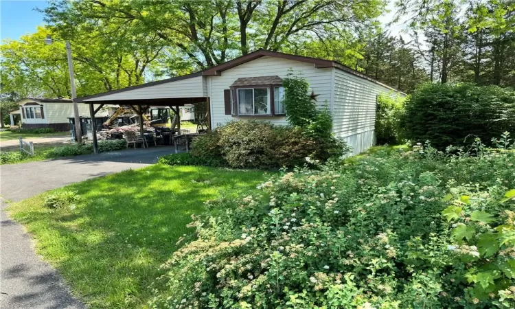 View of front of property with a front lawn