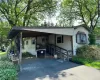 View of front of home with a carport