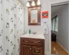 Bathroom featuring vanity and hardwood / wood-style flooring