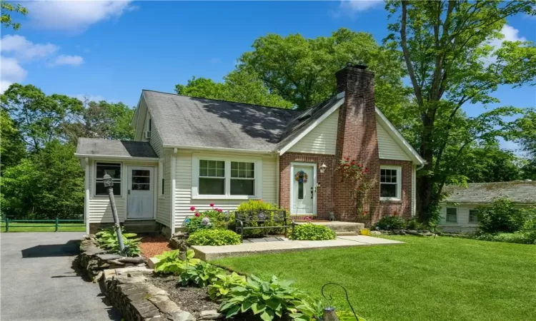 View of front of home with a front lawn