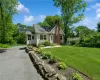 View of front of home featuring a front lawn