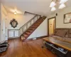 Living room featuring dark hardwood / wood-style flooring