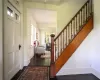 Foyer featuring dark wood-type flooring