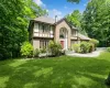 Tudor house with a front lawn