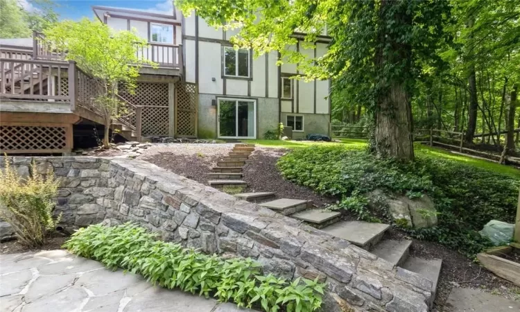 View of property's pool featuring a deck