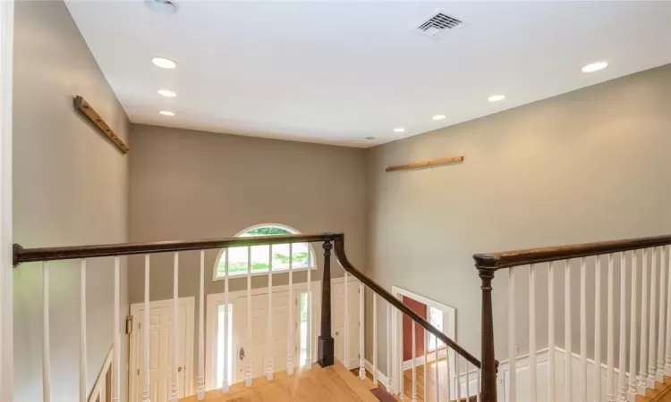 Corridor featuring light hardwood / wood-style floors