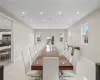 Dining area with light tile floors