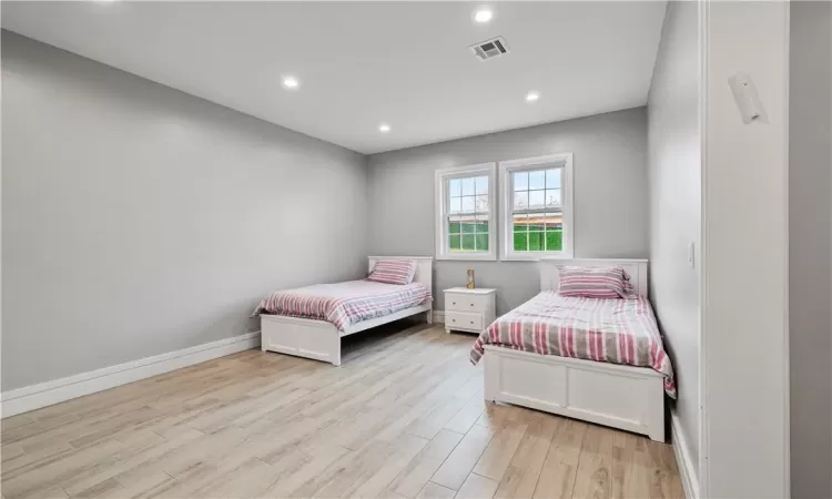 Bedroom featuring light hardwood / wood-style floors