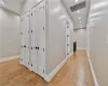 Corridor featuring light hardwood / wood-style flooring