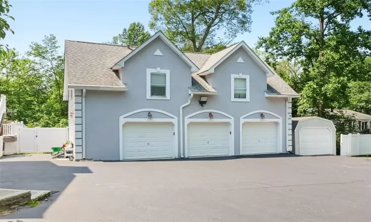 heated 3-car garage and finished rec room above.