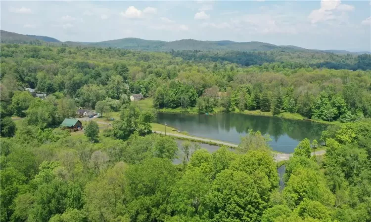 Aerial view with a water and mountain view