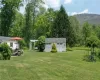 View of yard featuring an outdoor structure