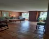 Living room with wood-type flooring