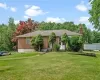 Ranch-style home with a front yard