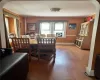 Dining area with hardwood / wood-style flooring