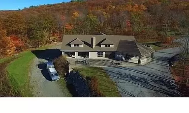 The front view with a grand covered carport entry.