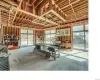 Your kitchen with soffits all around and a lighted drop ceiling center to highlight a future massive center island.  Sliders all around lead to an summer kitchen area and room for a pool!