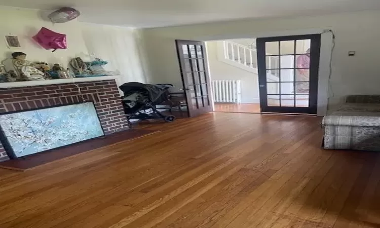 Living room featuring dark hardwood / wood-style floors