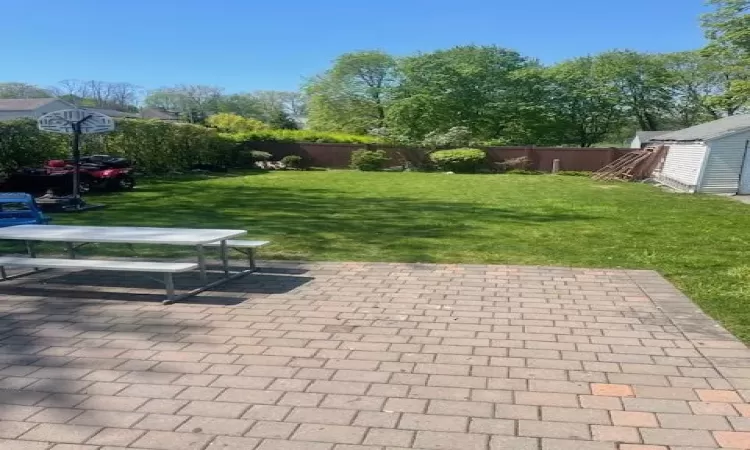 View of patio / terrace with a storage unit