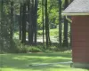 View of pond from side of home