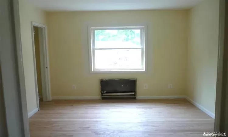 Spare room featuring light hardwood / wood-style flooring