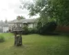 View of front of home featuring a front yard