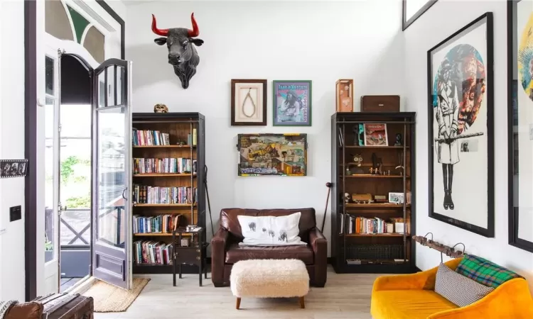 Sitting room featuring light hardwood / wood-style flooring