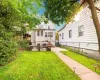 Rear view of property featuring a patio area and a yard