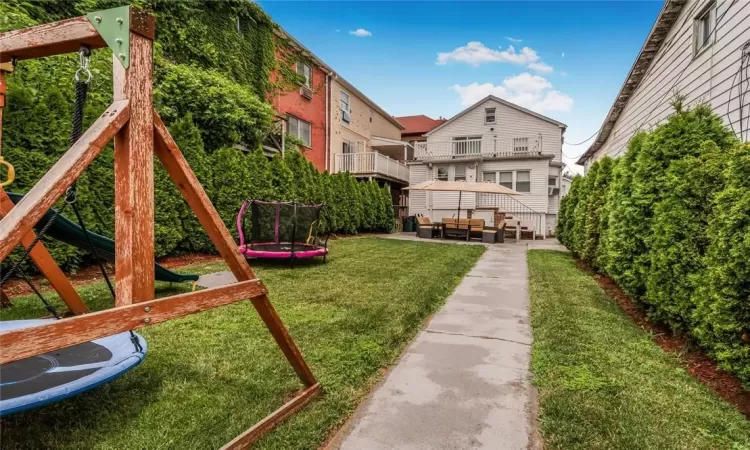 View of front yard and play area