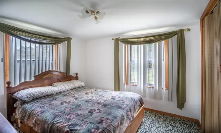 Bedroom featuring carpet floors