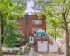 View of building exterior featuring a garage