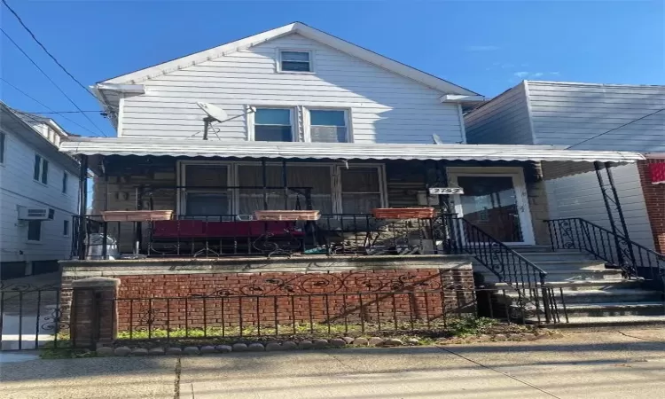 View of front facade with covered porch